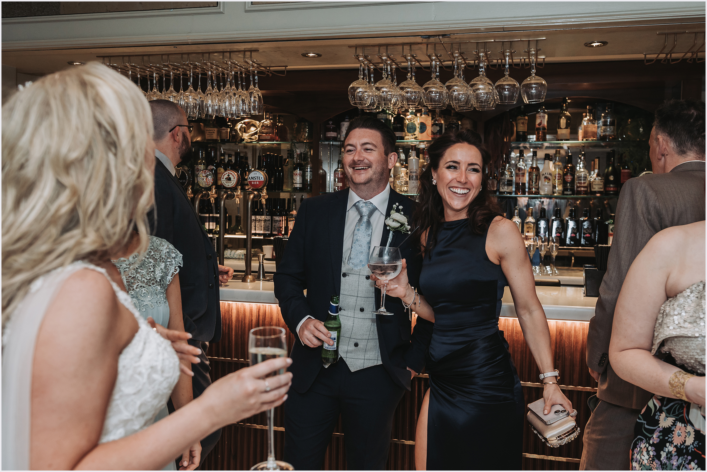 Guests enjoying themselves at the bar during the drinks reception at The Grosvenor Pulford Hotel and Spa.