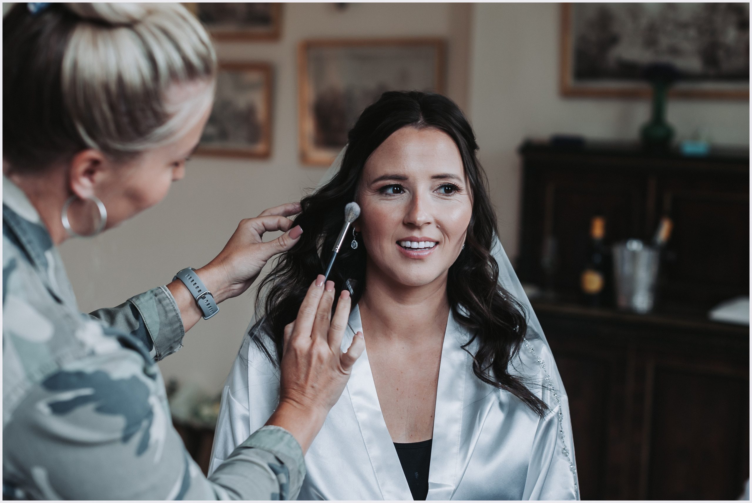 A beautiful bride has her make-up applied at Iscoyd Park, a stunning wedding venue outside Wrexham in North Wales.  Image captured by Helena Jayne Photography